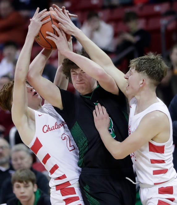 Almond-Bancroft High School's Clarence Pratt (3) against Abundant Life Christian School's Jacob Koon (2) and Nolan Wallace (14) in a Division 5 semifinal game during the WIAA state boys basketball tournament on Friday, March 15, 2024 at the Kohl Center in Madison, Wis. Abundant Life defeated Almond-Bancroft 42-37.
Wm. Glasheen USA TODAY NETWORK-Wisconsin