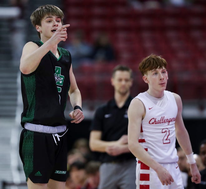 Almond-Bancroft High School's TJ Lamb (5) reacts after an Abundant Life Christian School turnover in a Division 5 semifinal game during the WIAA state boys basketball tournament on Friday, March 15, 2024 at the Kohl Center in Madison, Wis. Abundant Life Christian won the game, 42-37.