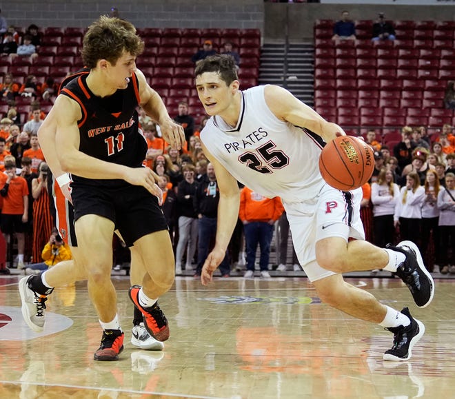 Pewaukee's Nick Janowski (25) drives the ball up the court as he is guarded by West Salem's Carter Pontius (11) during the second half of the WIAA Division 2 boys basketball state semifinal game on Friday March 15, 2024 at the Kohl Center in Madison, Wis.
