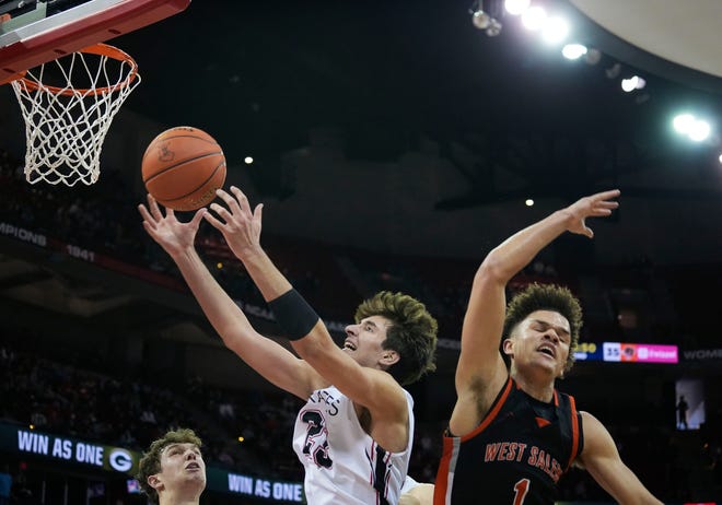 West Salem's Tamarrein Henderson (1) attempts to block Pewaukee's Luka Momcilovic (23) during the second half of the WIAA Division 2 boys basketball state semifinal game on Friday March 15, 2024 at the Kohl Center in Madison, Wis.