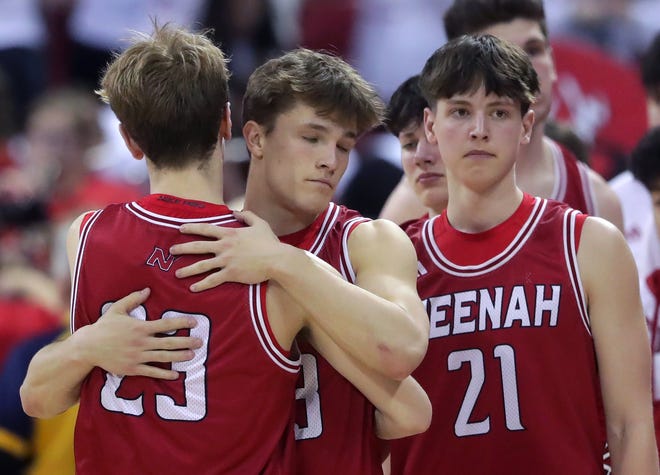 Neenah High School's Charlie Wunderlich (23) and Grant Dean (13) embrace following the Rocket’s loss to Arrowhead High School in a Division 1 semifinal game during the WIAA state boys basketball tournament on Friday, March 15, 2024 at the Kohl Center in Madison, Wis. Arrowhead defeated Neenah for 99-95 in four overtimes.
Wm. Glasheen USA TODAY NETWORK-Wisconsin
