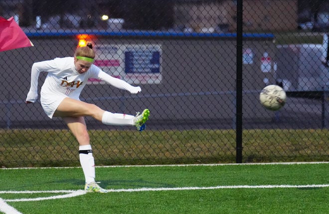Divine Savior Holy Angels' Avery Roethe (18) takes a corner kick during the match against Catholic Memorial at Mindiola Park in Waukesha, Tuesday, March 26, 2024.